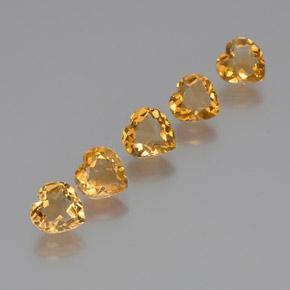 أحجار سيترين ذهبى-برتقالى فاتح-متوسط طبيعية، شكل القلب، VVS-VS، وزنها 4.74 قيراط