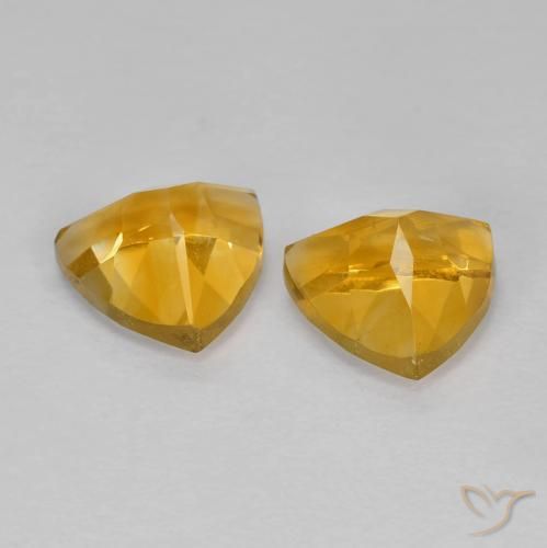 أحجار سيترين Medium Dark-Golden طبيعية، مثلثى، قليلا جدا، وزنها 1.51 قيراط