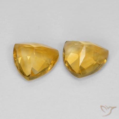 أحجار سيترين Medium Dark-Golden طبيعية، مثلثى، قليلا جدا، وزنها 1.40 قيراط