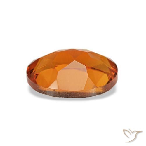 سيترين طبيعي بلون Medium Dark-Orange، وزن ‎0.73‎ قيراط، شكل بيضاوى، مقاس ‎7.1x5.1‎ مم
