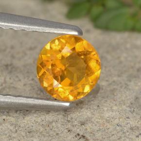 كلينوهيومايت طبيعي بلون أصفر ذهبي، وزن ‎0.42‎ قيراط، شكل دائري، مقاس ‎4.82‎ مم