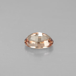عقيق متغير اللون بنى ذهبى إلى البرتقالى طبيعي، قصة بيضاوى، 0.66 قيراط، قليلا جدا