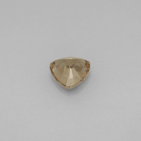 عقيق متغير اللون بنى مخضر إلى برتقالى طبيعي، مثلثى، 0.72 قيراط، قليلا جدا