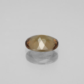 عقيق متغير اللون بنى ذهبى إلى البرتقالى طبيعي، قصة بيضاوى، 1.55 قيراط، قليلا جدا