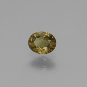 عقيق متغير اللون بنى داكن-متوسط طبيعي، قصة بيضاوى، 0.55 قيراط، قليلا جدا