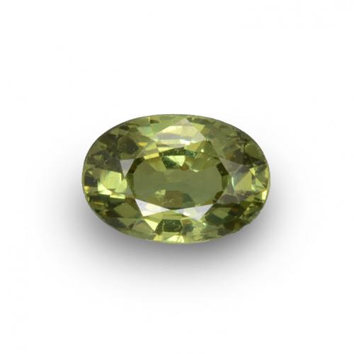 جارنيت ديمانتويد طبيعي بلون أخضر ذهبي، وزن ‎0.65‎ قيراط، شكل بيضاوى، مقاس ‎6.1x4.3‎ مم