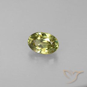 0.57ct طبيعي أصفر متوسط عقيق الديمانتويد, بيضوي, قليلا جدا