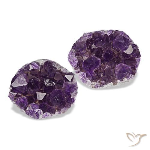 جمشت دروزي طبيعي بلون Medium Dark-Violet، وزن ‎13.49‎ قيراط، شكل شكل خيالي، مقاس ‎12.8x10.1‎ مم