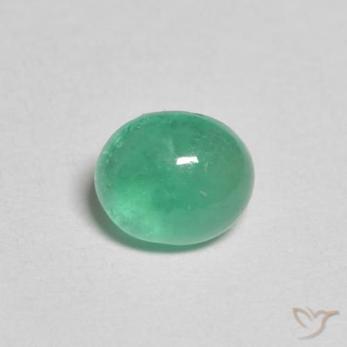 0.68ct طبيعي اخضر فاتح زمرد, بيضوي, نصف شفاف