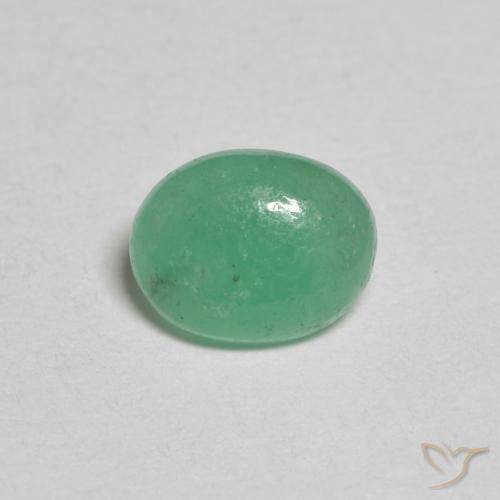 0.62ct طبيعي اخضر فاتح زمرد, بيضوي, نصف شفاف