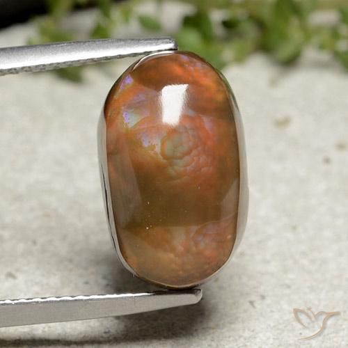 6.66ct طبيعي متعدد الألوان عقيق النار, بيضوي, غير شفاف