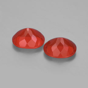 أحجار النار أوبال برتقالى محمر طبيعية، قصة بيضاوى، شفاف، وزنها  قيراط