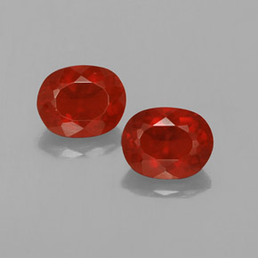 أحجار النار أوبال برتقالى محمر طبيعية، قصة بيضاوى، شفاف، وزنها  قيراط