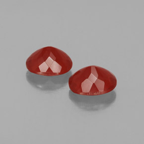 أحجار النار أوبال برتقالى محمر طبيعية، قصة بيضاوى، شفاف، وزنها  قيراط