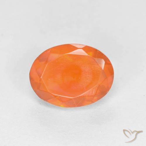 0.58ct طبيعي برتقالي زاهى النار أوبال, بيضوي, نصف شفاف