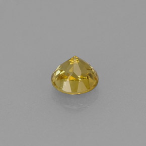 جارنيت غروسولاريت طبيعي بلون ذهبي، وزن ‎0.59‎ قيراط، شكل دائري، مقاس ‎4.67‎ مم