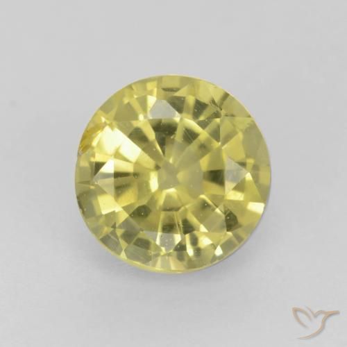 0.60ct طبيعي أصفر فاتح-متوسط عقيق غروسوليت, دائري, قليلا جدا