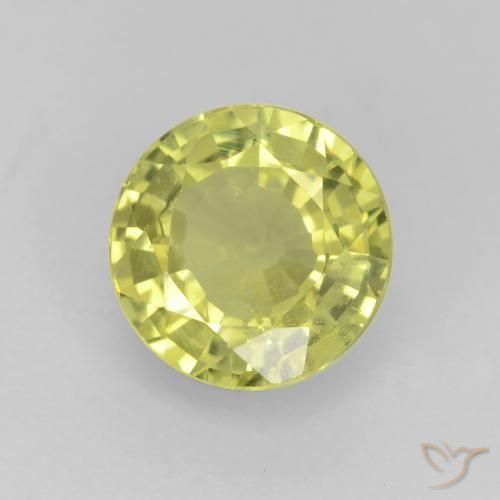 0.58ct طبيعي أصفر متوسط عقيق غروسوليت, دائري, قليلا جدا