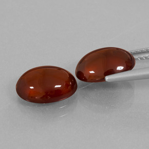 أحجار هيسونيت غارنيت برتقالي طبيعية، قصة بيضاوى، نصف شفاف، وزنها 6.21 قيراط