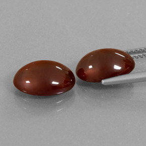 أحجار هيسونيت غارنيت أحمر قرمزى غامق طبيعية، قصة بيضاوى، نصف شفاف، وزنها 7.67 قيراط