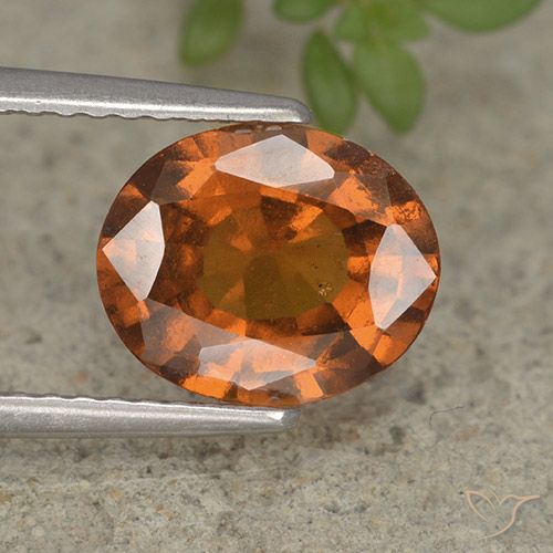 2.23ct طبيعي برتقالى داكن-متوسط عقيق هيسونيت, بيضوي, قليلا جدا