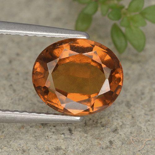 2.36ct طبيعي برتقالى داكن-متوسط عقيق هيسونيت, بيضوي, قليلا جدا