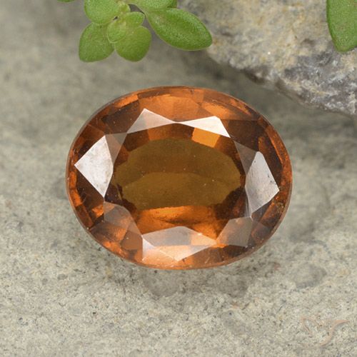 2.48ct طبيعي برتقالى متوسط عقيق هيسونيت, بيضوي, قليلا جدا