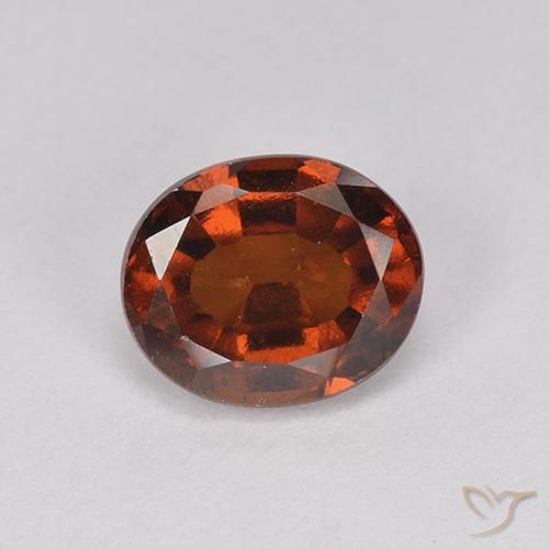 2.04ct طبيعي برتقالى كهرمانى عقيق هيسونيت, بيضوي, قليلا جدا
