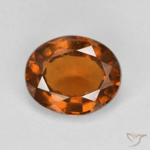 2.28ct طبيعي برتقالى كهرمانى عقيق هيسونيت, بيضوي, قليلا جدا