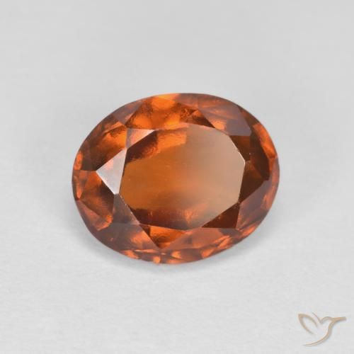 1.57ct طبيعي برتقالى كهرمانى عقيق هيسونيت, بيضوي, قليلا جدا