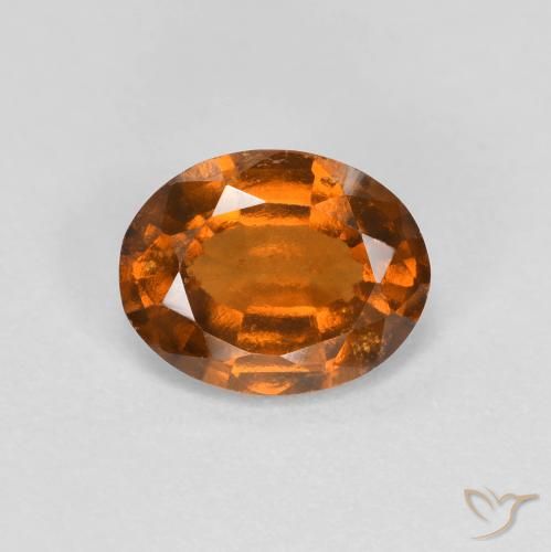 1.23ct طبيعي برتقالى متوسط عقيق هيسونيت, بيضوي, قليلا جدا
