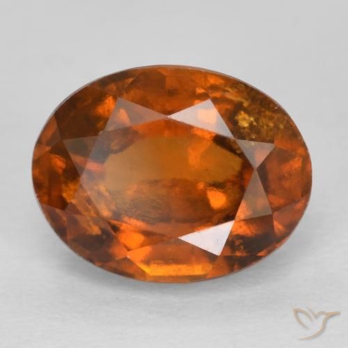 2.42ct طبيعي برتقالى كهرمانى عقيق هيسونيت, بيضوي, قليلا جدا