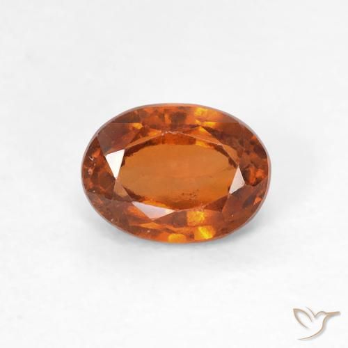 0.83ct طبيعي Medium Dark-Orange هيسونيت غارنيت, بيضوي, قليلا جدا