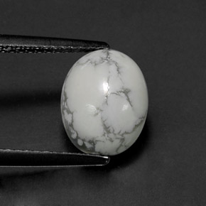 حجر الهاوليت أبيض رمادى طبيعي، قصة بيضاوى، 2.60 قيراط، غير شفاف