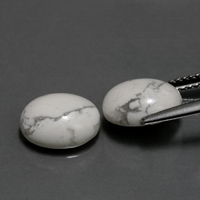 أحجار هاوليت أبيض رمادى طبيعية، قصة بيضاوى، غير شفاف، وزنها  قيراط