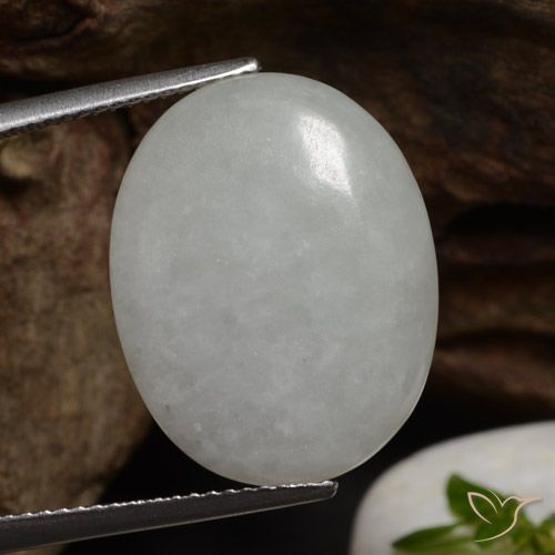 11.79ct طبيعي أبيض رمادى اليشمك, بيضوي, نصف شفاف