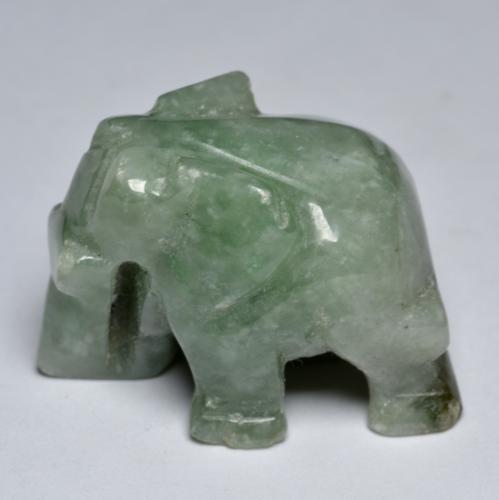 جاديت طبيعي بلون Medium Light Green، وزن ‎64.40‎ قيراط، شكل شكل خيالي، مقاس ‎25.7x16.2‎ مم