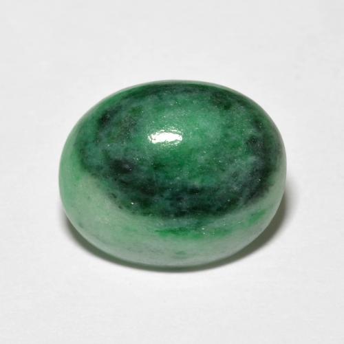 جاديت طبيعي بلون Medium Dark-Green، وزن ‎4.42‎ قيراط، شكل بيضاوى، مقاس ‎12.6x10.4‎ مم