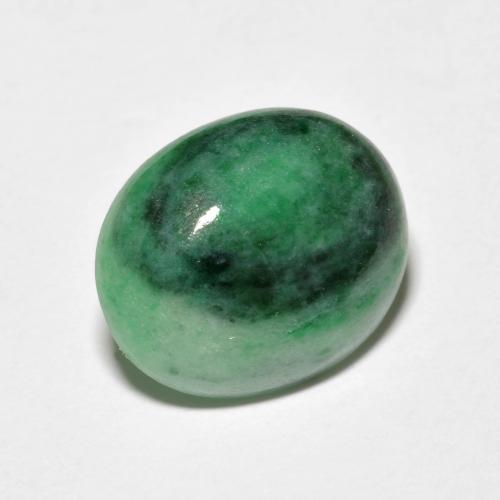 جاديت طبيعي بلون Medium Dark-Green، وزن ‎4.42‎ قيراط، شكل بيضاوى، مقاس ‎12.6x10.4‎ مم