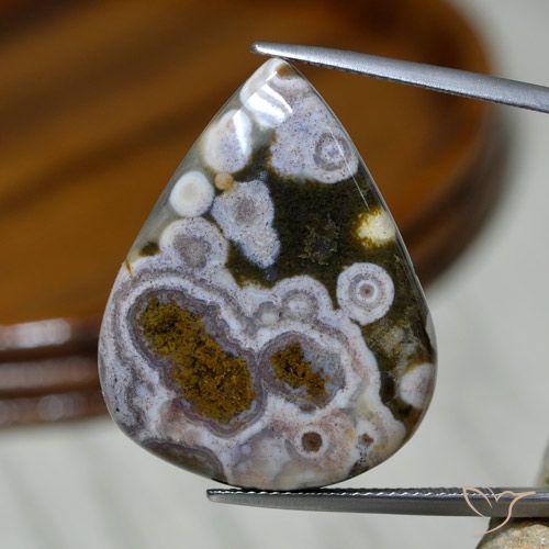 37.19ct طبيعي متعدد الألوان يشب أو جاسبر, شكل الكمثرى, غير شفاف