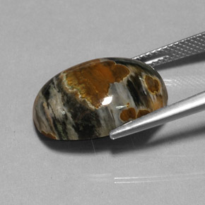 يشب طبيعي بلون متعدد الألوان، وزن ‎11.51‎ قيراط، شكل بيضاوى، مقاس ‎18.2x13.4‎ مم