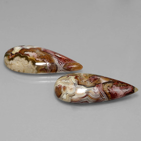 أحجار يشب أو جاسبر متعدد الألوان طبيعية، شكل الكمثرى، غير شفاف، وزنها  قيراط