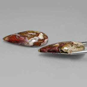 أحجار يشب أو جاسبر متعدد الألوان طبيعية، شكل الكمثرى، غير شفاف، وزنها  قيراط