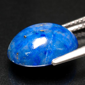لازورد طبيعي بلون أزرق ملكي، وزن ‎5.76‎ قيراط، شكل بيضاوى، مقاس ‎12.9x9.8‎ مم
