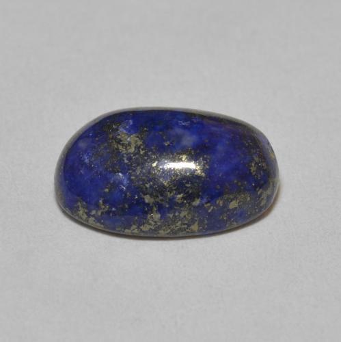 لازورد طبيعي بلون أزرق غامق جدا، وزن ‎6.77‎ قيراط، شكل بيضاوى، مقاس ‎13.7x9.3‎ مم