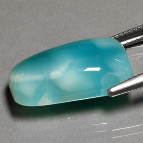 لاريمار طبيعي بلون أخضر أزرق، وزن ‎13.77‎ قيراط، شكل شكل خيالي، مقاس ‎19.9x12.2‎ مم