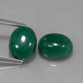 أحجار ملاكيت أخضر متعدد الألوان طبيعية، قصة بيضاوى، غير شفاف، وزنها  قيراط