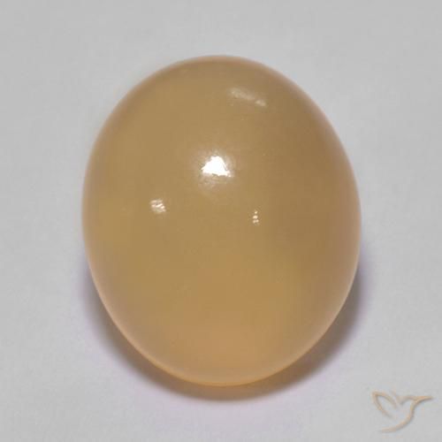 5.01ct طبيعي ذهبى-برتقالى متوسط حجر القمر, بيضوي, نصف شفاف