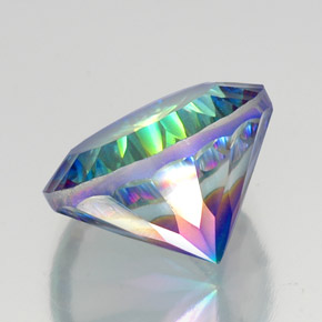 كوارتز ميستيك طبيعي بلون قوس قزح فاخر، وزن ‎19.83‎ قيراط، شكل دائري، مقاس ‎18.11‎ مم