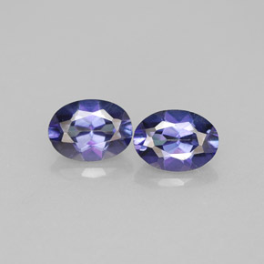 توباز ميستيك طبيعي بلون بنفسجي، وزن ‎‎ قيراط، شكل بيضاوى، مقاس ‎6.9x5.2‎ مم